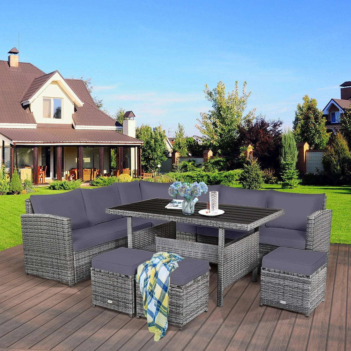 Costway Ensemble repas de jardin en rotin de 7 pièces, canapé d’angle, canapé et pouf — Voir les détails