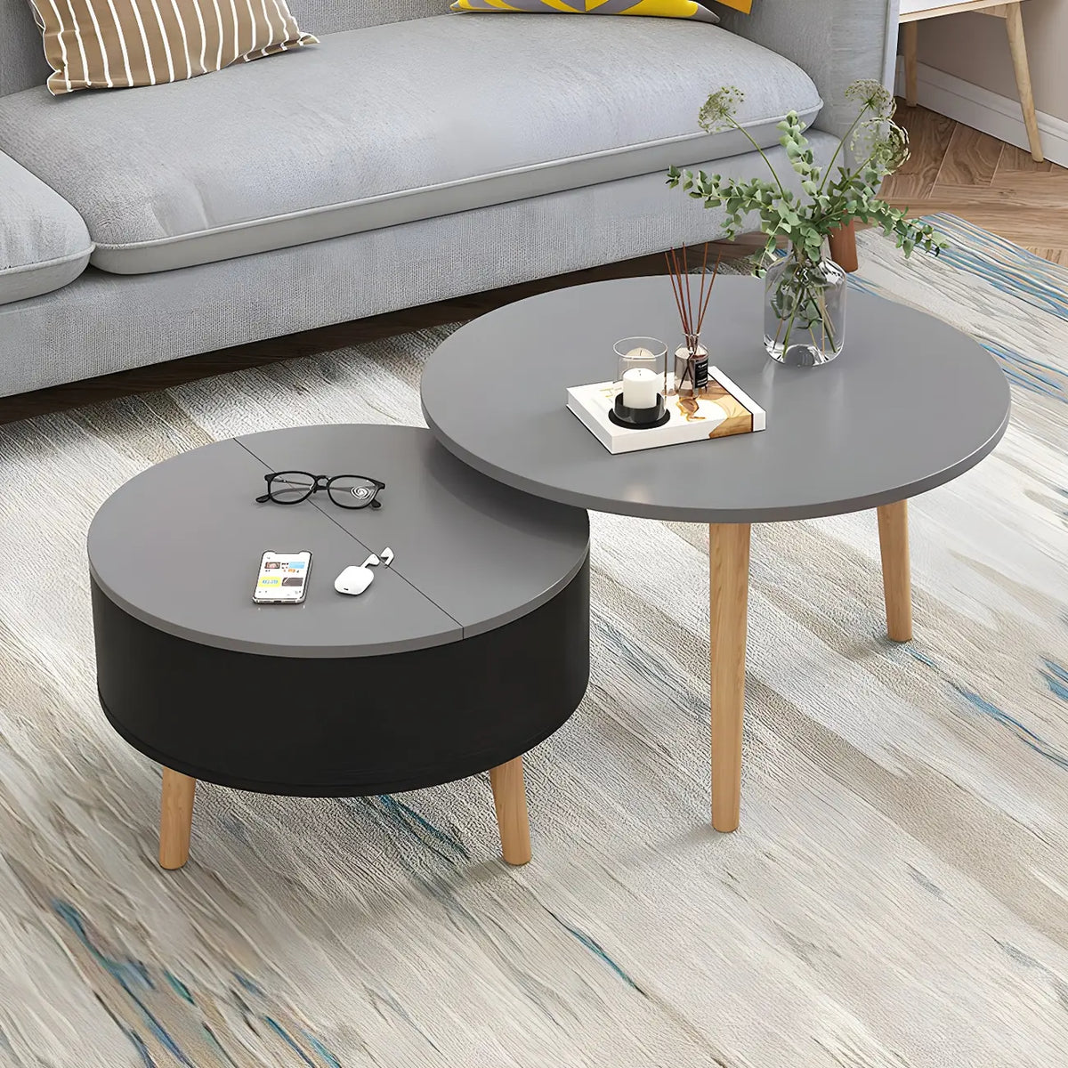 Moderner runder Couchtisch aus schwarzem und weißem Holz mit Stauraum