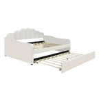 Gestoffeerd ligbed van volledige grootte met schelpvormige rugleuning en onderschuifbed