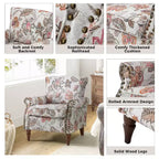 Fauteuil traditionnel Araceli en bois, rembourré à motif floral, avec dossier à oreilles et bordure cloutée| ART OF LIVING DESIGNS