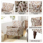 Fauteuil traditionnel Araceli en bois, rembourré à motif floral, avec dossier à oreilles et bordure cloutée| ART OF LIVING DESIGNS