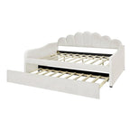 Gestoffeerd ligbed van volledige grootte met schelpvormige rugleuning en onderschuifbed