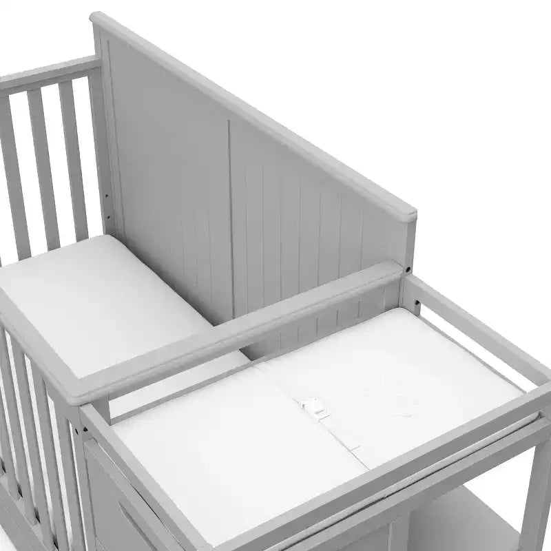 5-in-1 converteerbaar babybedje en commode met lade