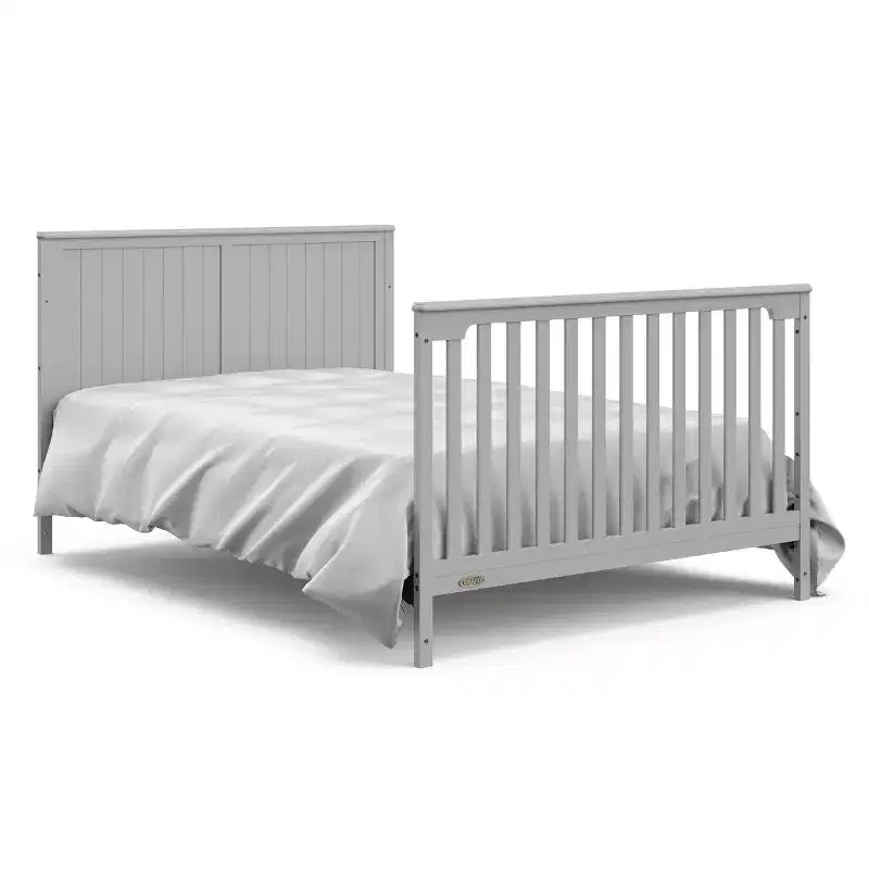 5-in-1 converteerbaar babybedje en commode met lade