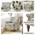 Fauteuil traditionnel Araceli en bois, rembourré à motif floral, avec dossier à oreilles et bordure cloutée| ART OF LIVING DESIGNS