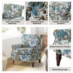 Fauteuil traditionnel Araceli en bois, rembourré à motif floral, avec dossier à oreilles et bordure cloutée| ART OF LIVING DESIGNS