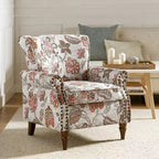 Fauteuil traditionnel Araceli en bois, rembourré à motif floral, avec dossier à oreilles et bordure cloutée| ART OF LIVING DESIGNS