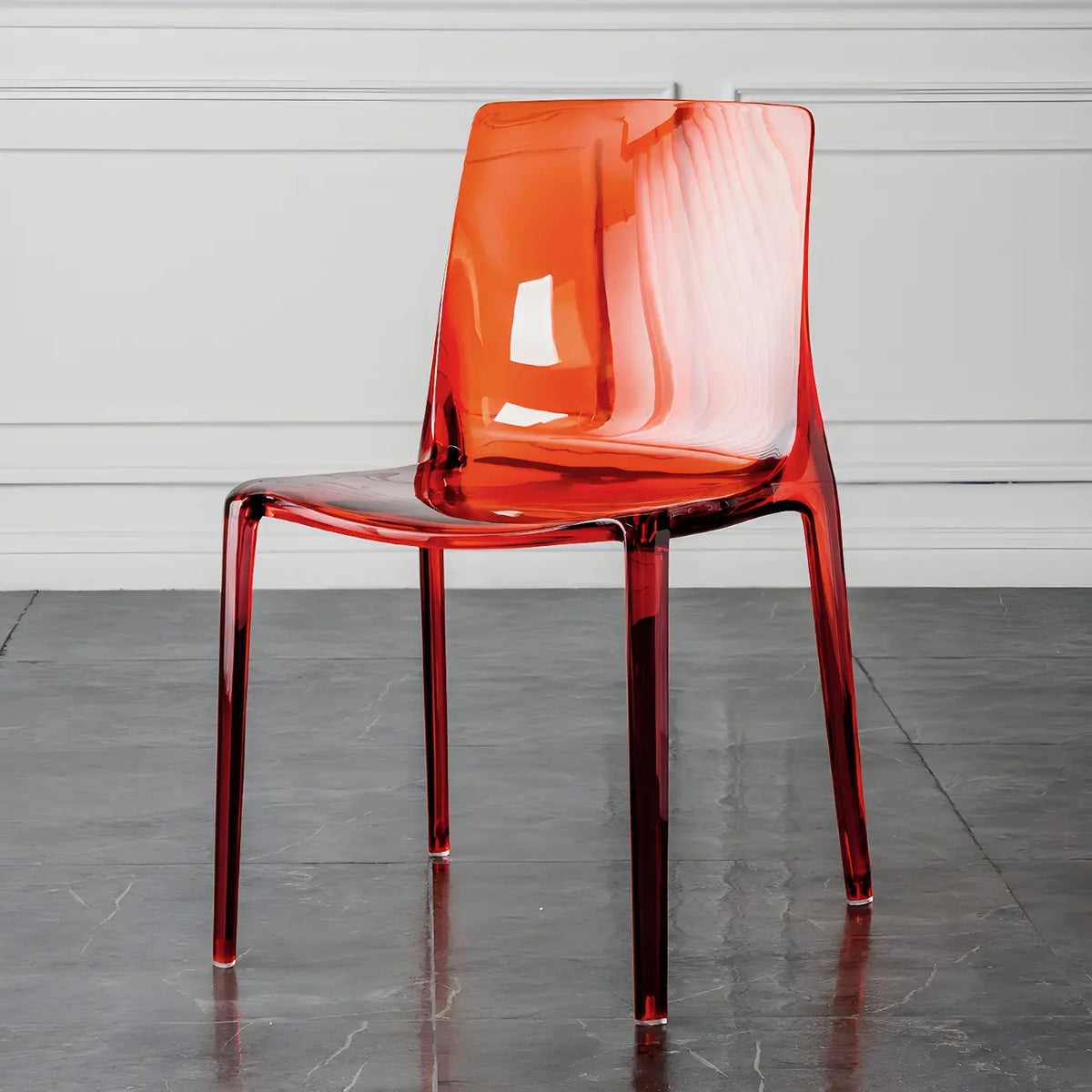 Chaise de salle à manger sans accoudoirs à dossier bas en acrylique ambré