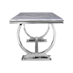 Table de salle à manger moderne avec piètement en U en métal inoxydable