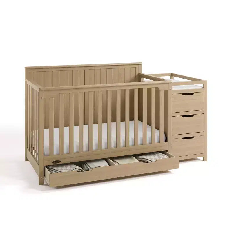 5-in-1 converteerbaar babybedje en commode met lade