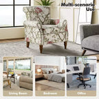 Fauteuil traditionnel Araceli en bois, rembourré à motif floral, avec dossier à oreilles et bordure cloutée| ART OF LIVING DESIGNS