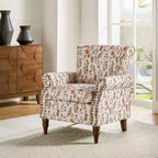 Fauteuil traditionnel Araceli en bois, rembourré à motif floral, avec dossier à oreilles et bordure cloutée| ART OF LIVING DESIGNS